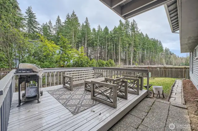 Backyard - access to deck on lower level.