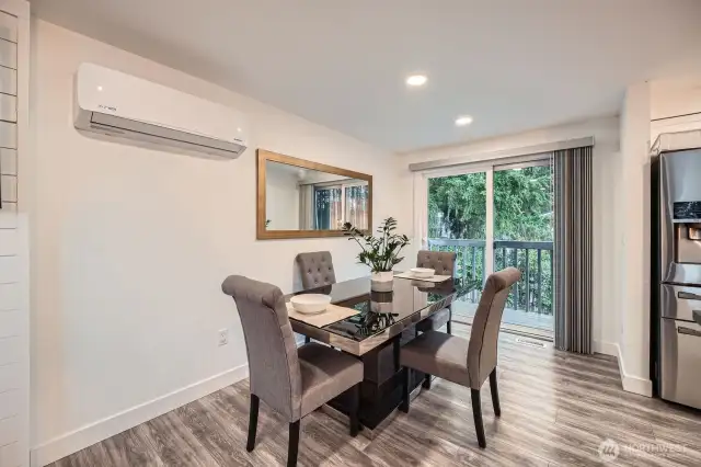 Dining space with patio off kitchen.