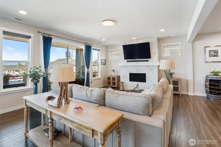 Watch t.v. or the sun set behind the Olympics? Both!