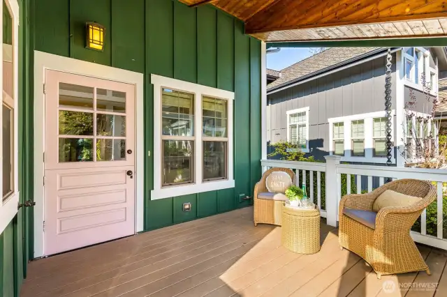 Spacious front porch with natural wood overhand complete with it's own skylight