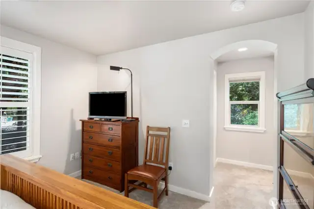 Main floor bedroom - walk-in closet to the left of window