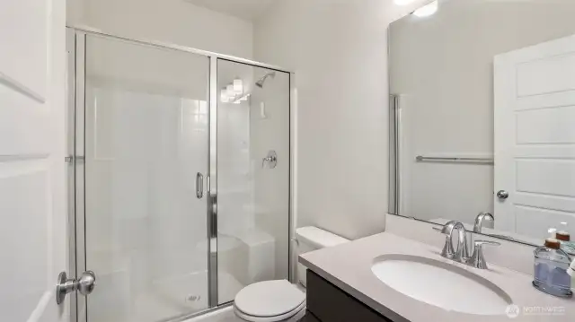 Convenient 3/4 bathroom downstairs—perfectly designed to welcome and accommodate your guests