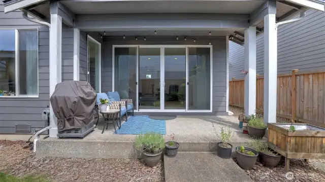 Covered outdoor living area perfect for year-round enjoyment!