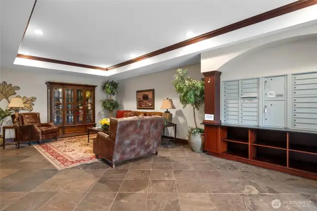 Lobby of building with mailboxes.