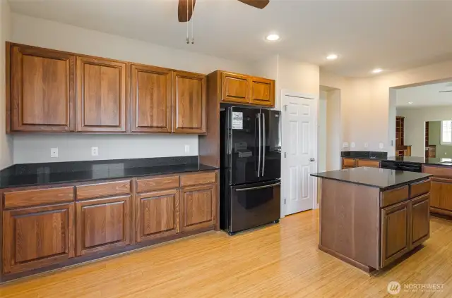 Another view.  Work island, tons of storage and counter space plus pantry.