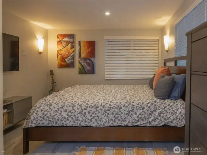 Enjoy the full primary bedroom with a large walk in closet downstairs with a sitting area