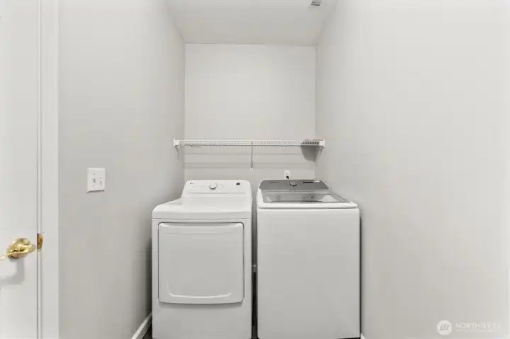 Washer and dryer also located off family room