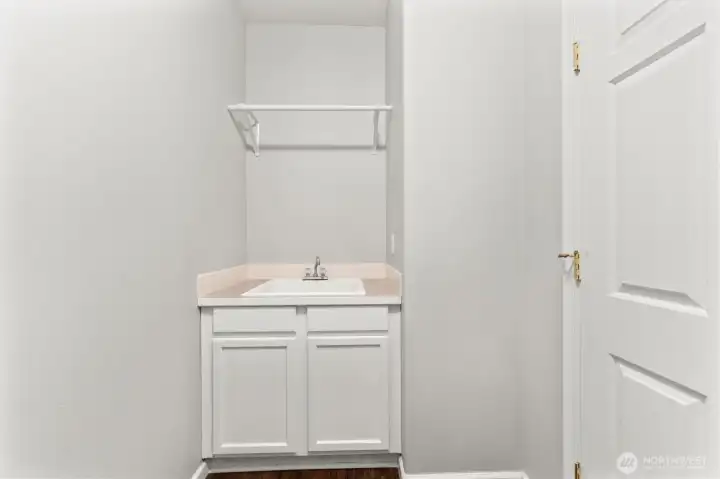 Laundry room has its own sink