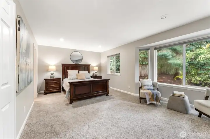 Private primary suite on its own floor with extra seating space