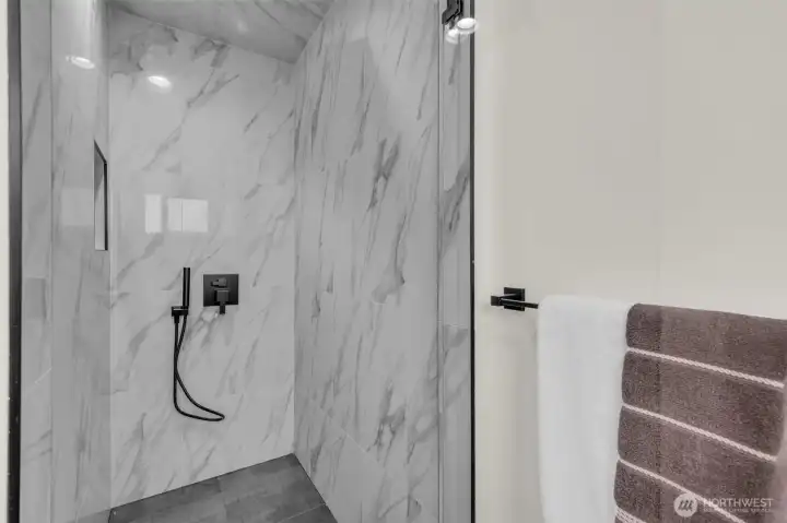 Larger walk-in shower (is bigger than it looks in this pic).
