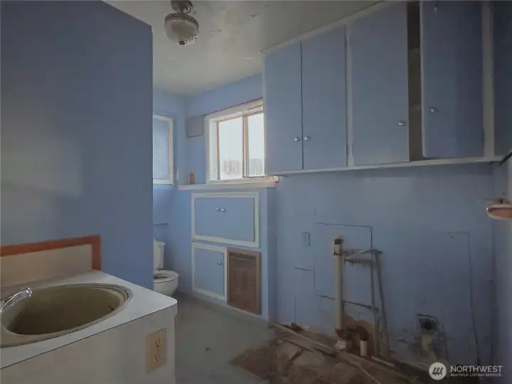 Bathroom with washer/dryer hookup on main floor