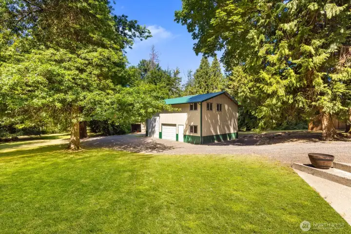 Welcome to your 1,000 square foot shop! Plenty of space here with an xtra large slot for your bigger toys. Additional parking available on both sides of the structure