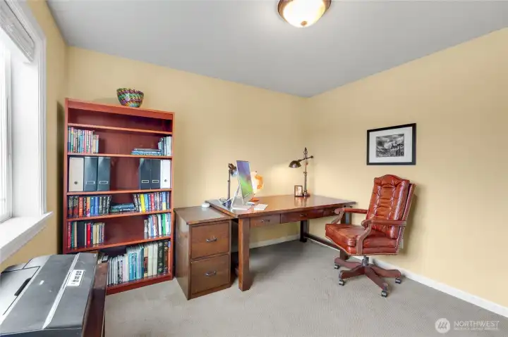 Currently used an an office, this is a bedroom with custom fitted closet.