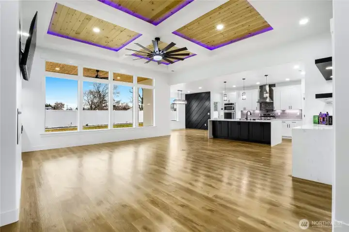 Open-concept living space showcasing the quality finishes and modern design style you can expect from Del Rancho Custom Homes LLC, including luxury vinyl plank flooring and seamless flow.