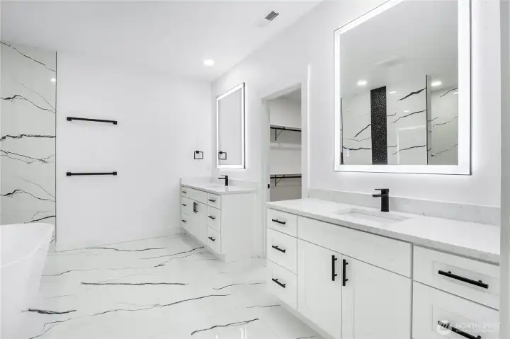 Spa-inspired bathroom design with tile work and quartz surfaces, reflecting the elevated finishes included in this new construction opportunity.