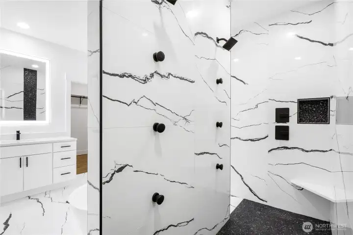Primary bathroom example featuring a tile shower and modern finishes, showcasing the quality and attention to detail typical of Del Rancho Custom Homes.