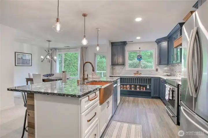 This kitchen even has pop-up charging stations.