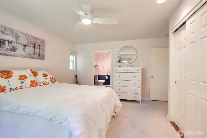 Primary with full bath, new closet doors, & new door to provide privacy in bathroom. Primary with full bath, new closet doors, & new door to provide privacy in bathroom.