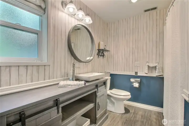 Primary refreshed full bath.