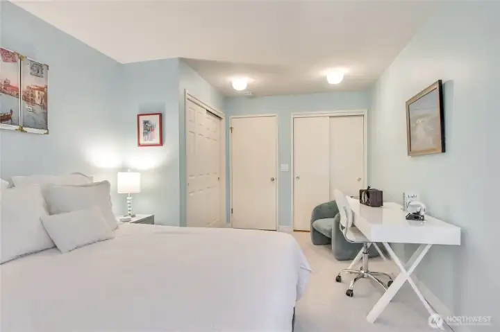 2nd bedroom has new closet doors and newly painted door. 2 closets! 2nd bedroom has new closet doors and newly painted door. 2 closets!