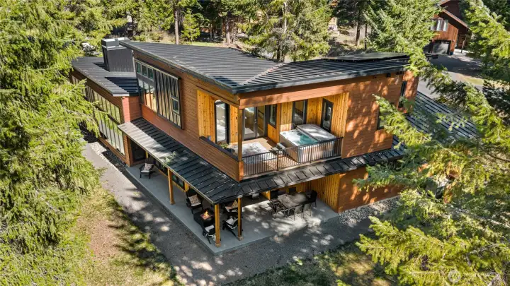 The functional design maximizes both indoor comfort and outdoor living spaces.