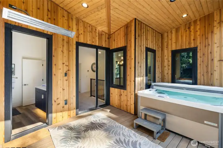 You can access the hot tub deck off the hallway or via the guest bathroom for maximum flexibility.