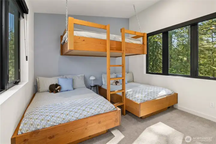 The super creative bunk room on the second level, great for the young and/or the young at heart.