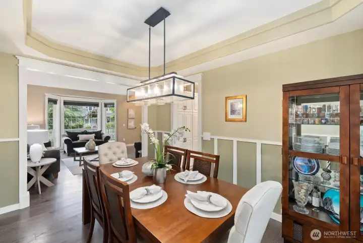 Dining room with coved ceilings and wainscoting. Dining room with coved ceilings and wainscoting.