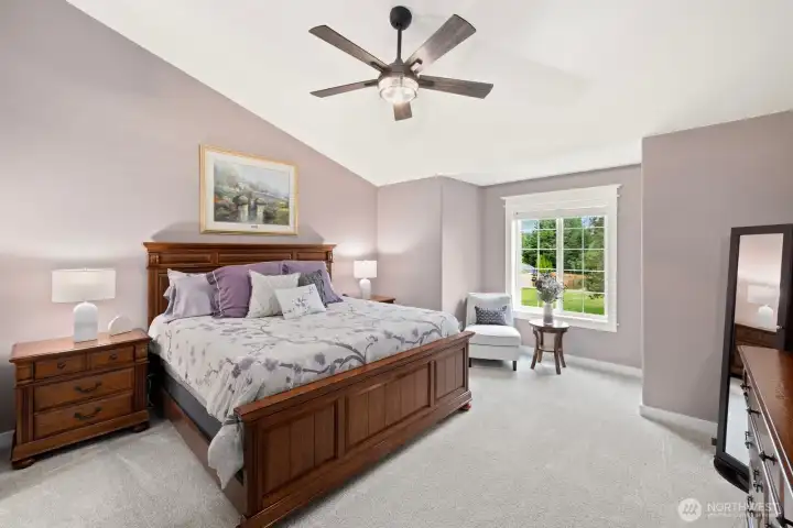 Primary suite with vaulted ceilings. Primary suite with vaulted ceilings.