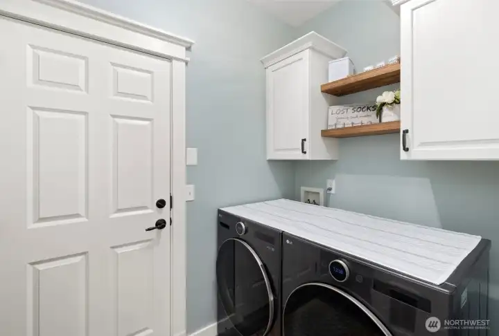 Downstairs laundry/mudroom. Come in from garage and drop your shoes and gear! Downstairs laundry/mudroom. Come in from garage and drop your shoes and gear!