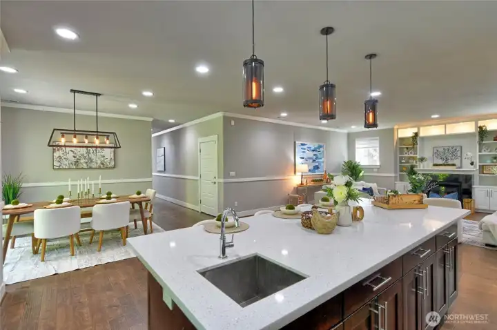 Open to the living room and dining area.
