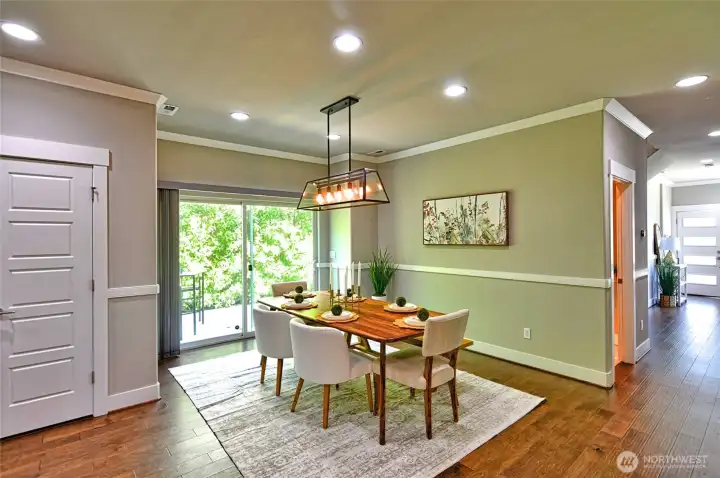 Dining space conveniently located adjacent to the kitchen and living areas.