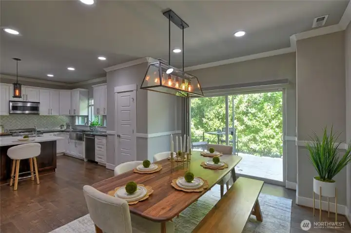 Dining area overlooking the backyard, perfect for indoor-outdoor entertaining.