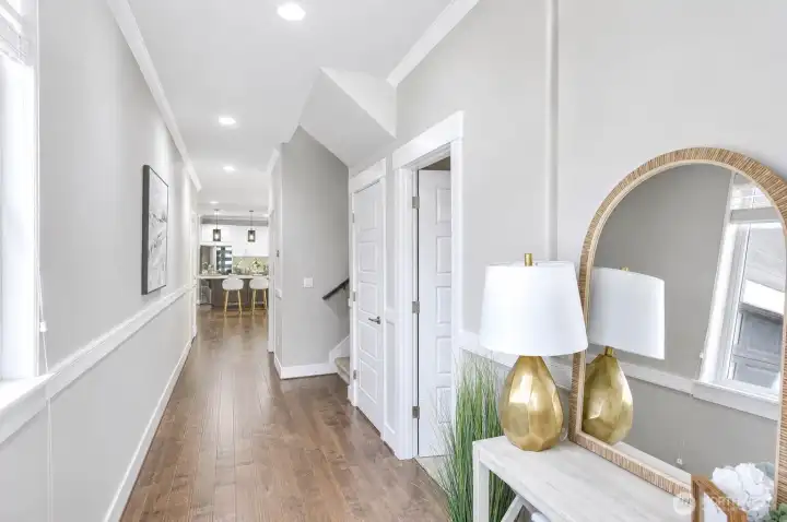 Main hallway with access to the office or guest bedroom. Main hallway with access to the office or guest bedroom.