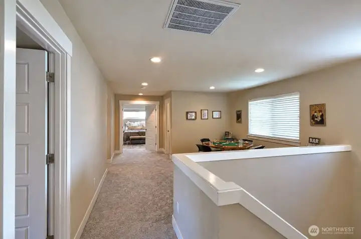 Upper-level landing provides additional living and flex space. Upper-level landing provides additional living and flex space.