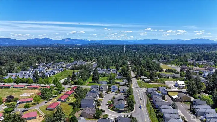 Aerial view of the neighborhood with beautiful mountain and territorial views.