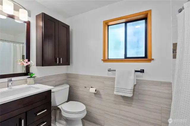 Guest/second bathroom with tub and heated floors!