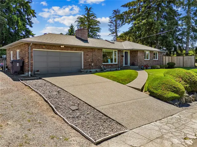 The attached garage holds two cars and the drive way has ample parking for your guests.