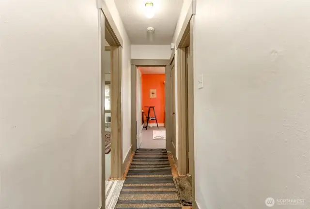 Hallway for the two bedrooms and the full bathroom