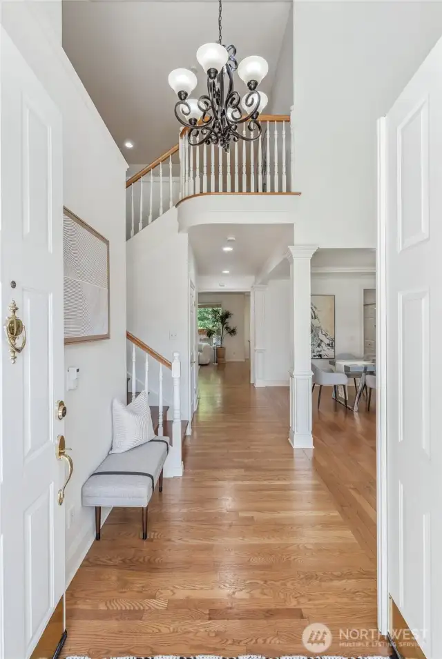 Step inside to a soaring entry with hardwood floors that flow throughout the main living areas.