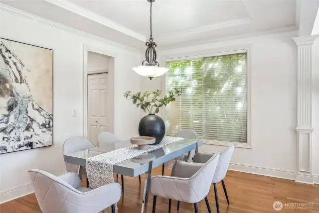 The formal dining room is a bright and welcoming space to connect over meals.