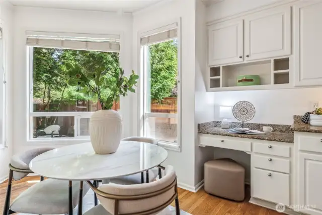 A convenient planning desk next to the casual dining area.