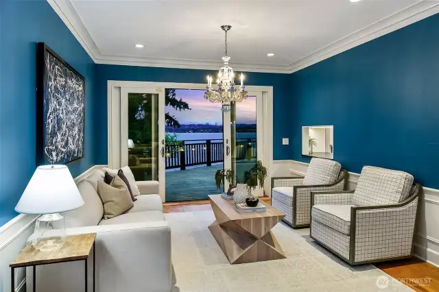 This room could be used as dining or living as shown here. The flow to the deck and Wisteria is perfection
