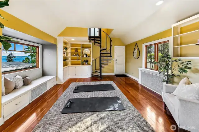 Annex area - seen here as workout room- 2 car garage accessed via that door