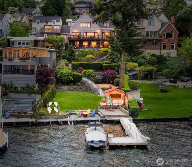 Twinkle lights, boat lift, cabana, terraced gardens, viewing deck and a welcoming home on the water