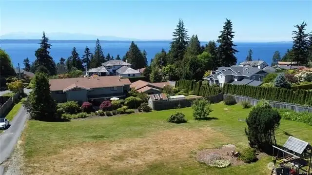 This photo is of the lot before construction. Look at that view!!