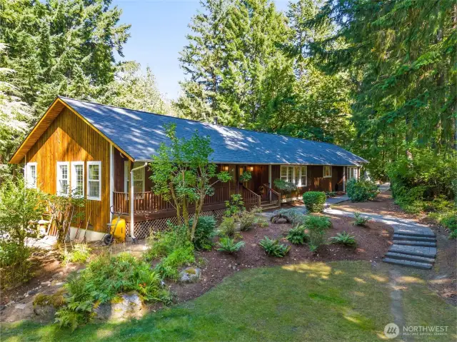Nestled on over four acres in Olympia's popular Oyster Bay location, this large rambler is ready to share the future with you!