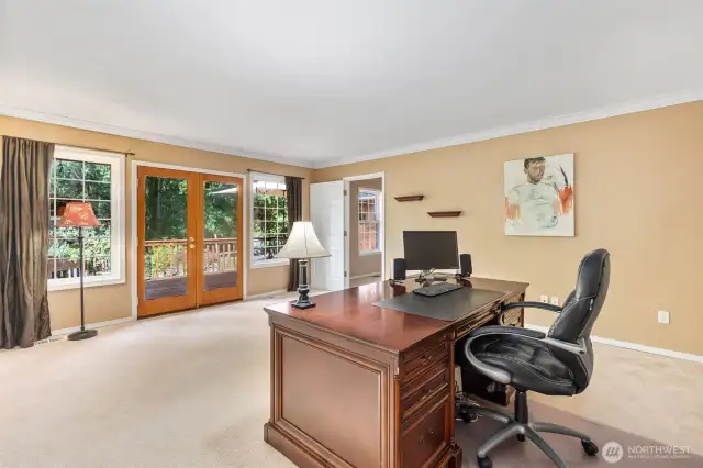 French doors lead from the office to the expansive rear deck. Not a bad view from the desk!