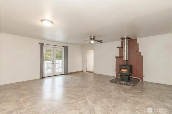 Frestanding wood fireplace heats entire home.
