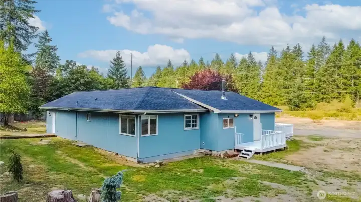 Side and back of home.  Access to laundry/mud room.